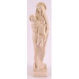 A cream pottery Madonna with child, ca. 1930. Possibly Gouda, South Holland, h 44 cm.