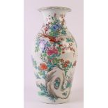 A baluster-shaped porcelain famille rose vase with folded neck edge, China, Tao-Kuang (1821-1851).