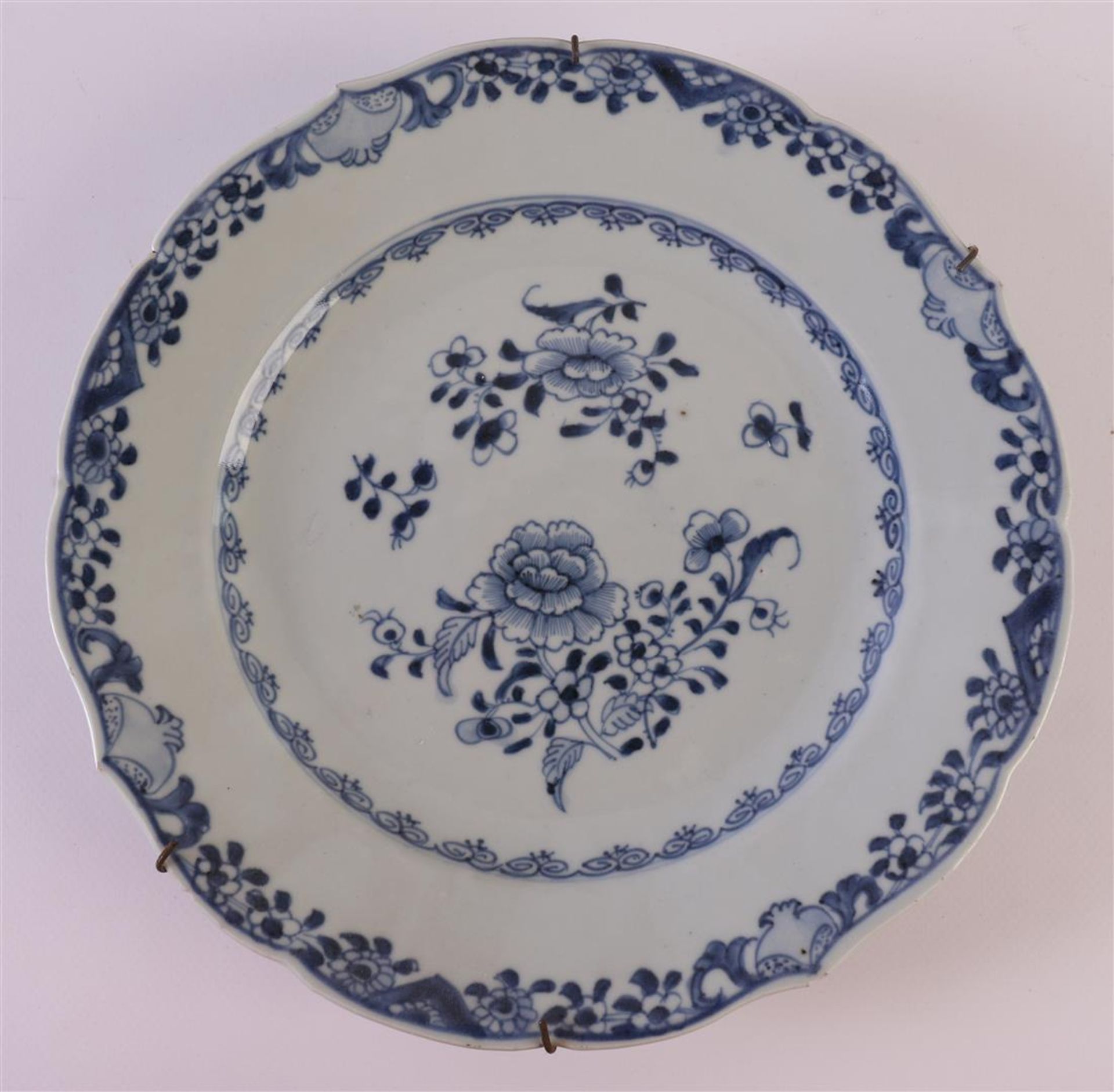 Four blue/white porcelain contoured plates, China, Qianlong (1736-1795). Blue underglaze floral - Image 2 of 12