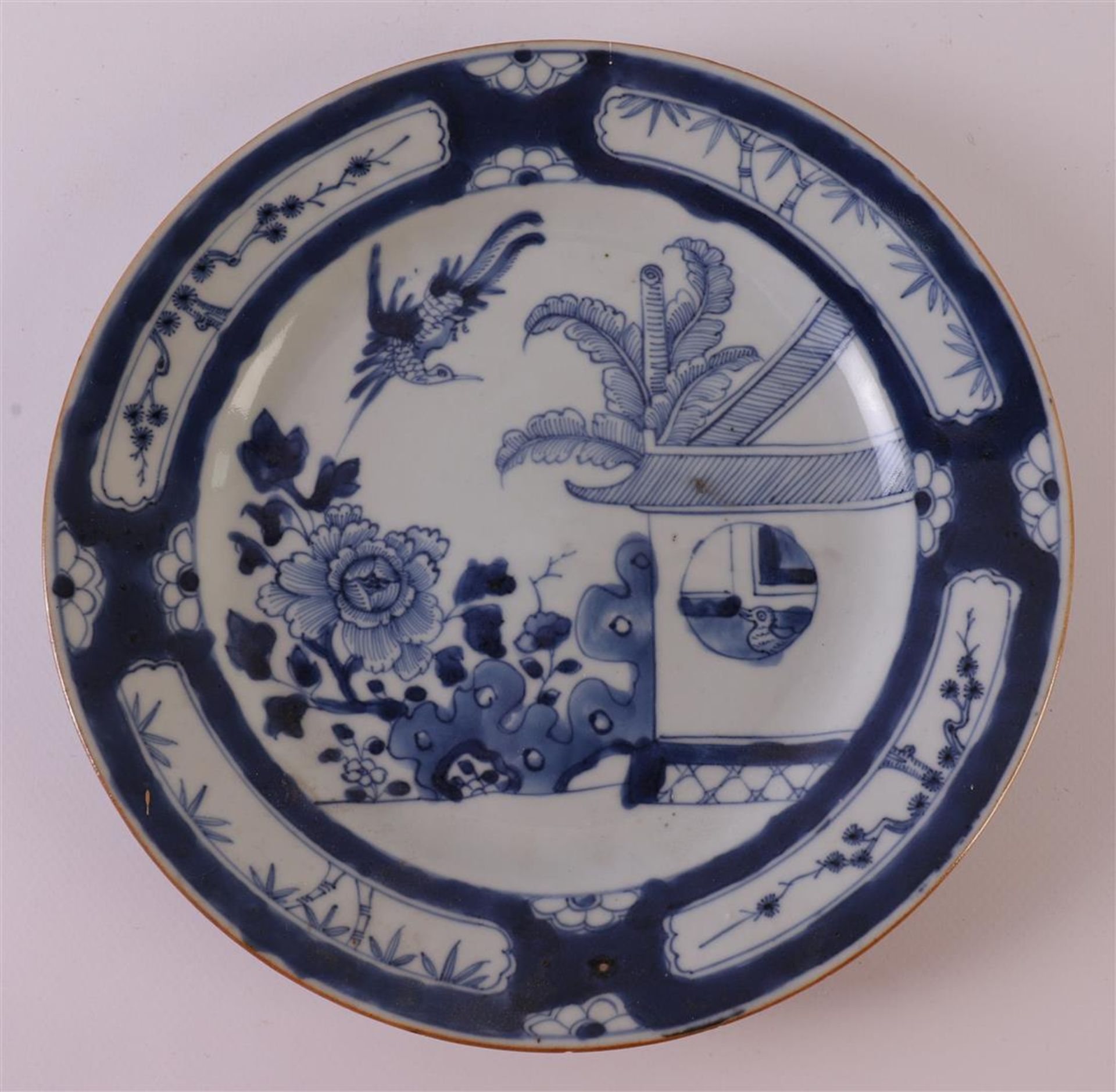 A blue/white porcelain dish with the decor 'Cuckoo in the house', China, Qianlong, 1st half of the