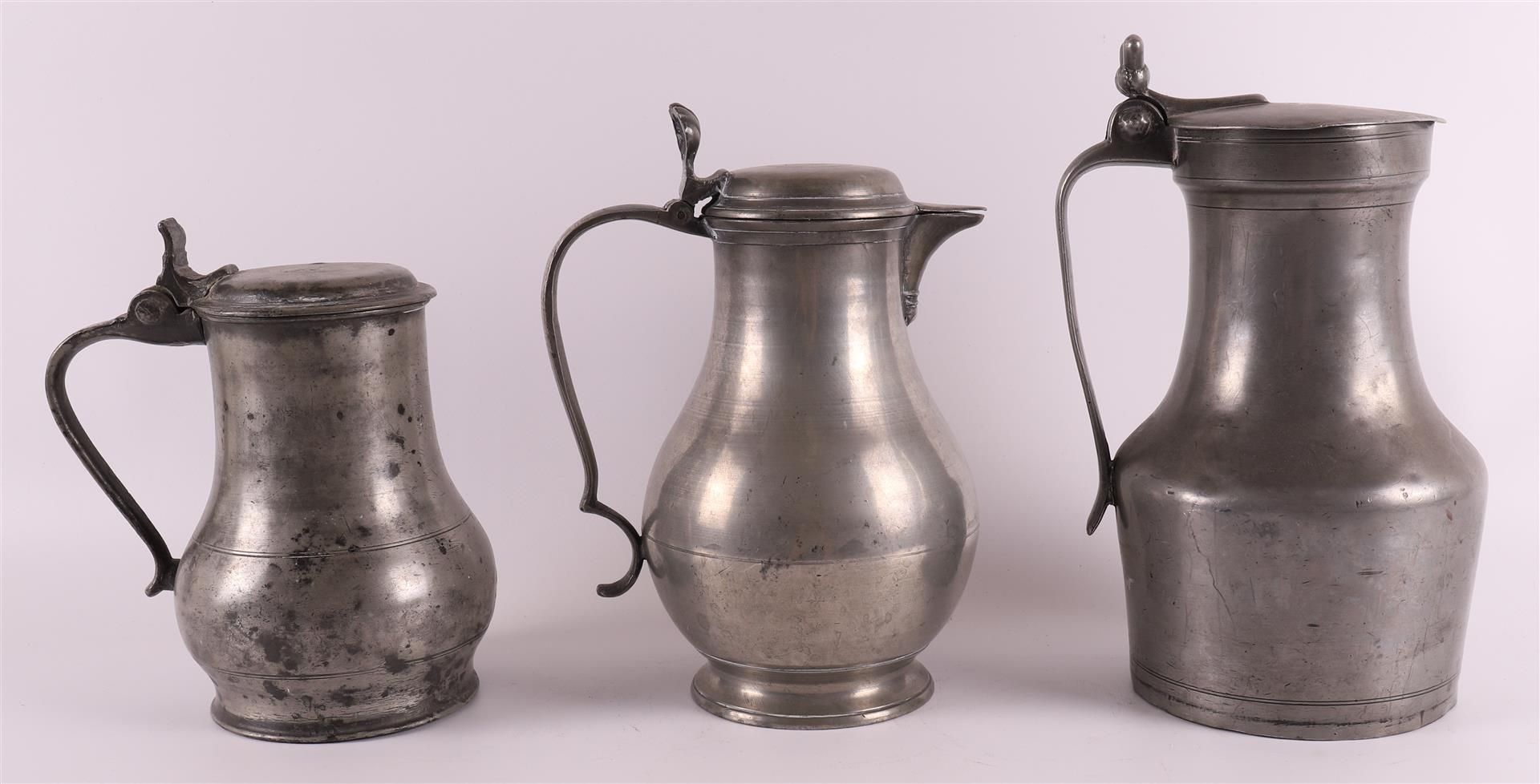 A clear pewter wine jug, so-called acorn jug, France 18th century, h 25.5 cm. Here are two other - Image 4 of 6