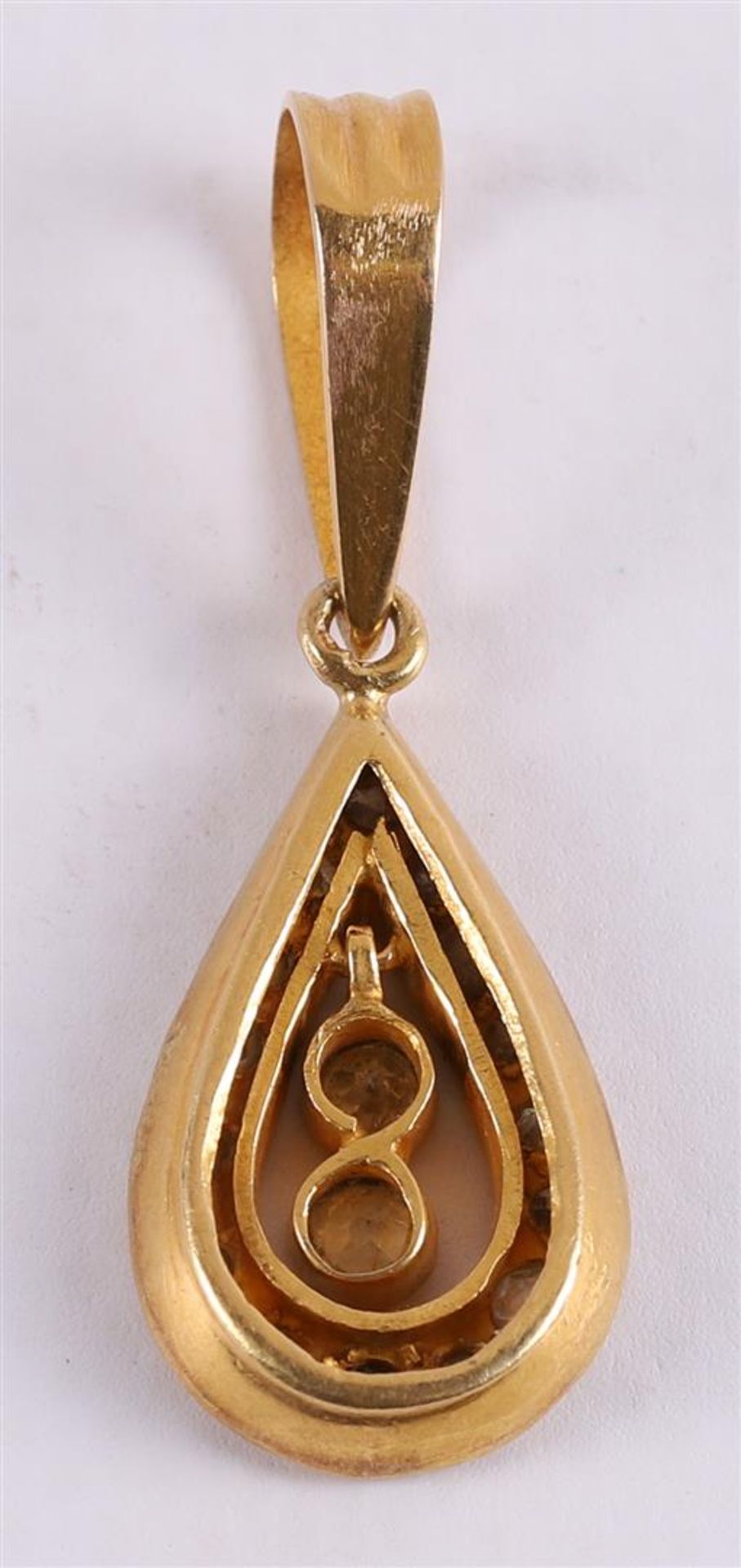 A 14 kt yellow gold drop-shaped pendant, set with 17 brilliant cut diamonds. - Image 2 of 2