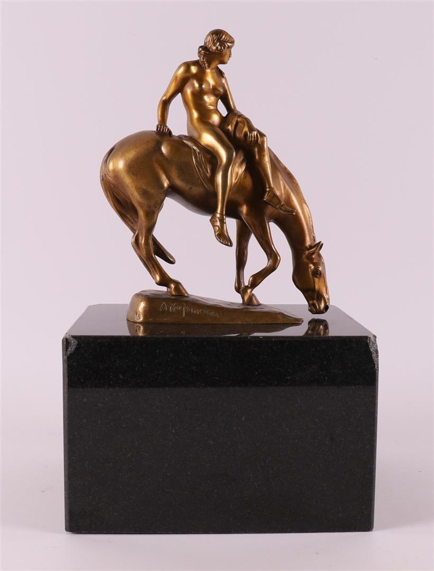 Hussmann, Albert Hinrich (1874-1946) A bronze female nude on horseback.