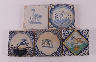A blue/white tile with a decor of an ostrich with an ox's head, Holland,