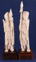 A pair of carved ivory warriors with a lance, sword and pagoda, China, Qing dyn