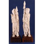 A pair of carved ivory warriors with a lance, sword and pagoda, China, Qing dyn