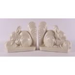 A pair of earthenware Art Deco bookends in the shape of squirrels, France,