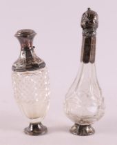Two various glass odor bottles with silver flip cap, frame and base, 2nd half