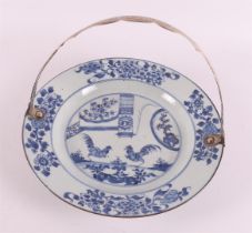 A blue/white porcelain 'cock dish', China, Qianlong 18th century.