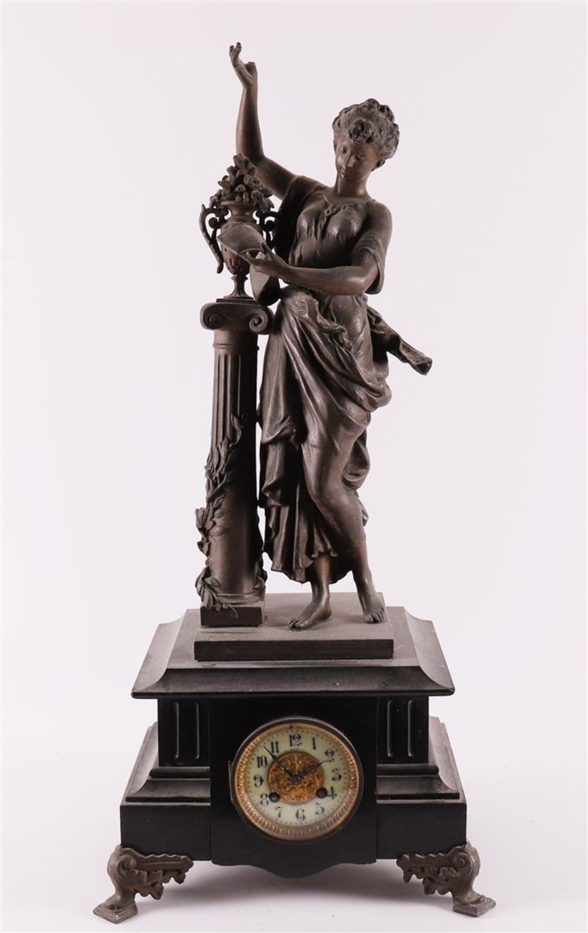 A mantel clock in black natural stone casing, France, ca. 1880.