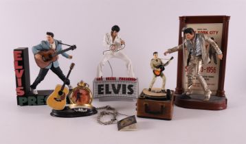 A lot of various Elvis Presley memorablia, including music boxes.