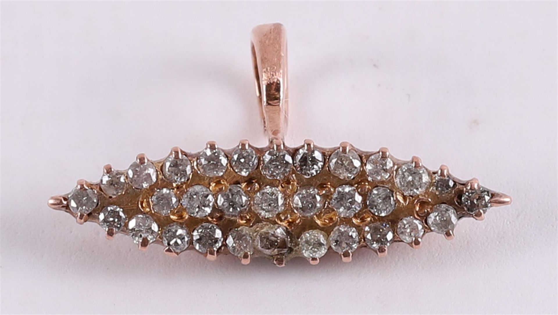 A 14 kt 585/1000 rose gold pointed oval pendant, set with many zirconias.