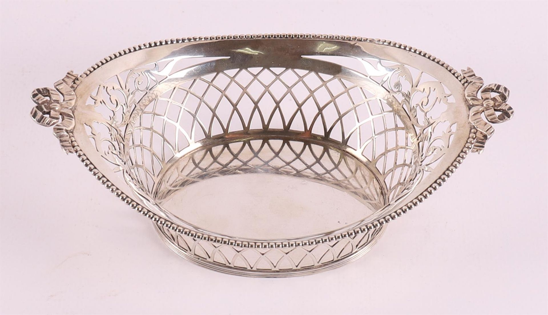 A silver openwork boat-shaped chocolate basket, year letter 1911. - Image 6 of 9