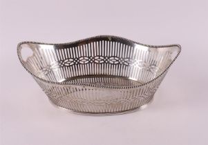 A silver boat-shaped bread basket with pearl edge decoration, 1926.