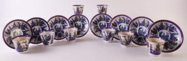 A series of six colored earthenware cups and saucers, 19th century