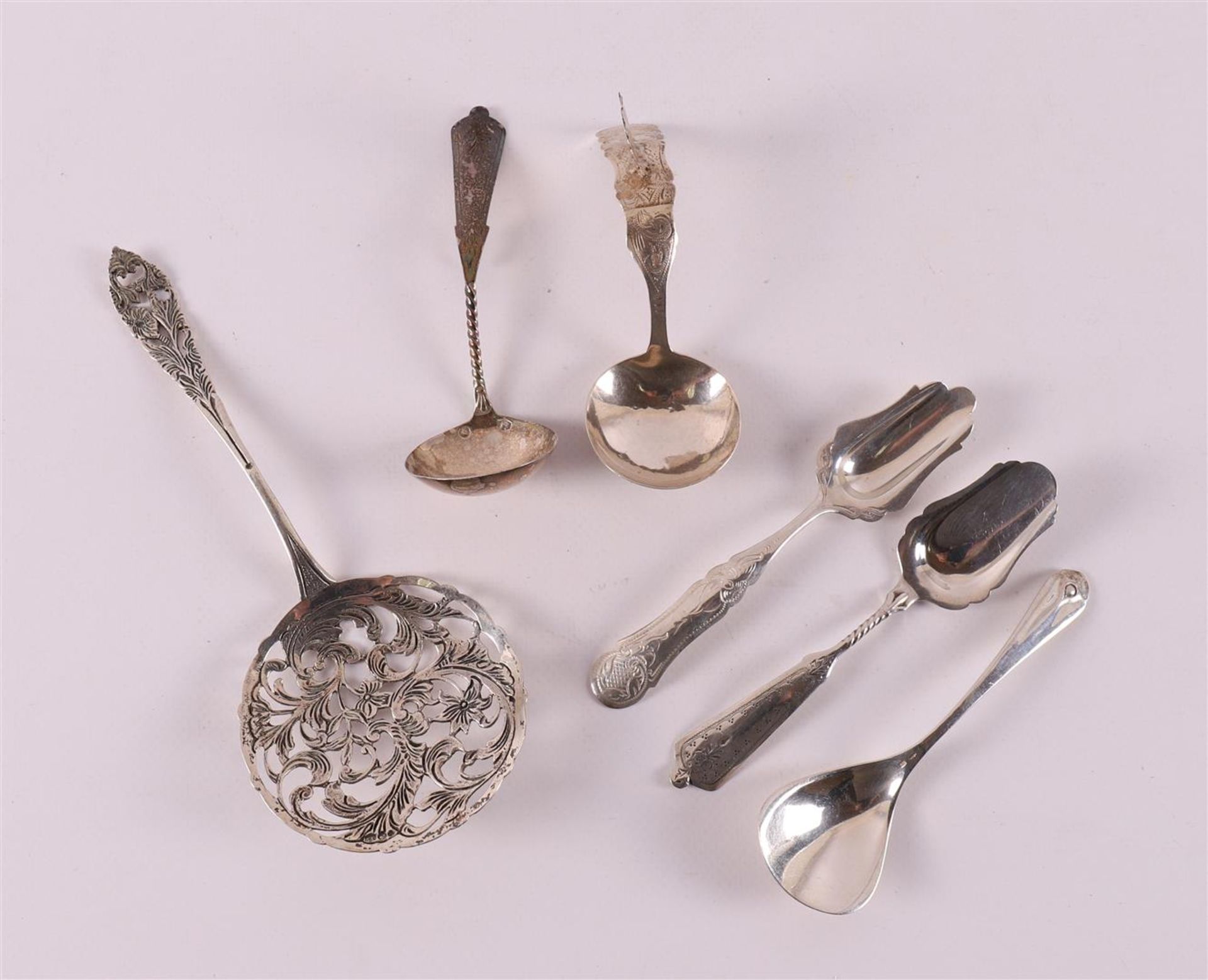 A second grade 835/1000 silver wet fruit scoop, 20th century.