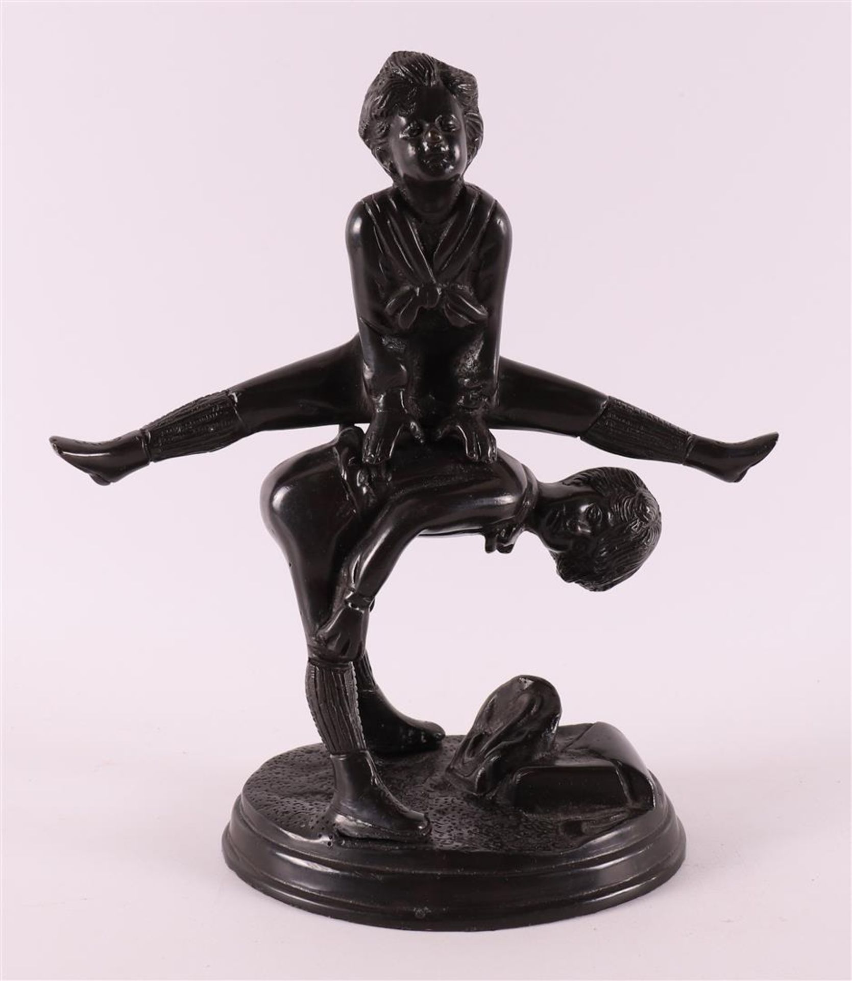 Bronze sculpture of children jumping, based on an antique example, 21st century