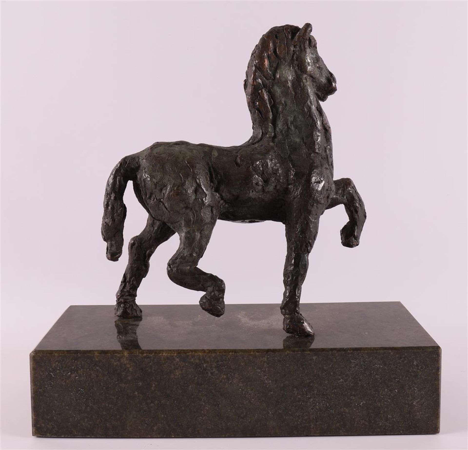 A brown patinated bronze horse on green natural stone base, 20th century. - Image 2 of 4