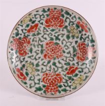 A porcelain famille verte dish, China, Kangxi, 18th century.