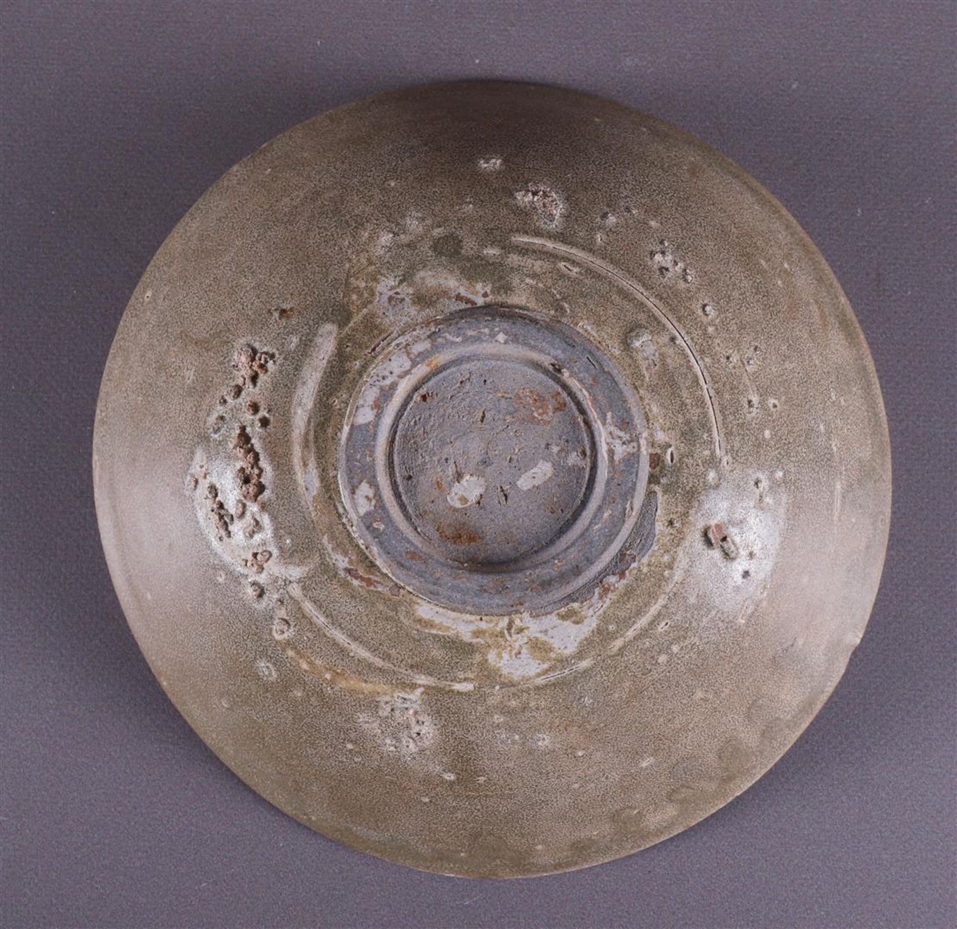 A green glazed stoneware bowl on stand ring, China, Song/Ming. - Image 8 of 8