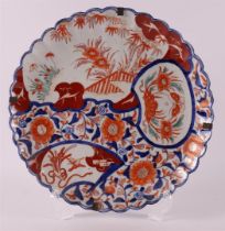 A contoured porcelain Imari dish, Japan, Meiji, around 1900.