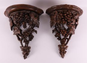 A set of wooden wall consoles with carved decor including grapes, 20th century