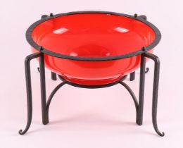 A red glass 'Tango' fruit bowl in wrought iron frame, Czechoslovakia,