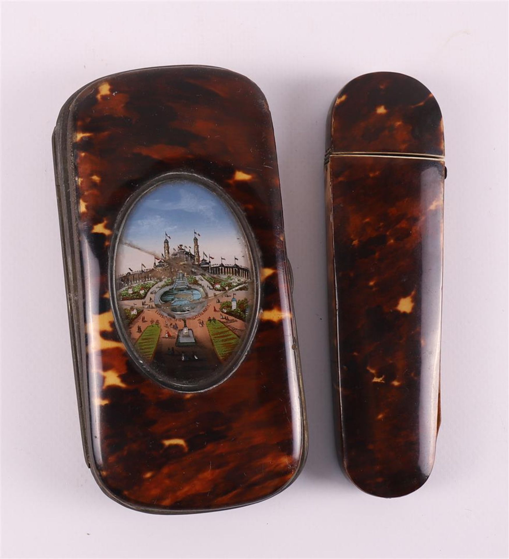 A tortoiseshell glasses case and cigar case, around 1900.