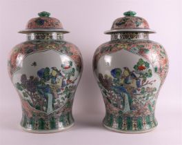 A pair of baluster-shaped famille verte covered vases, China, 20th/21st century.