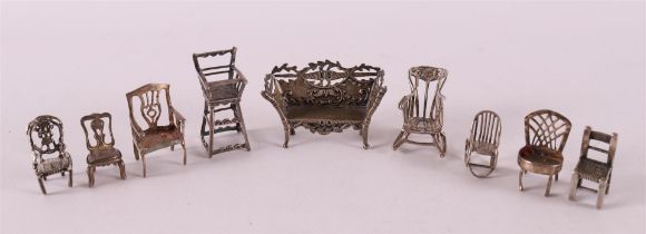 Etagere silver. Nine various chairs and a sofa, 20th century.