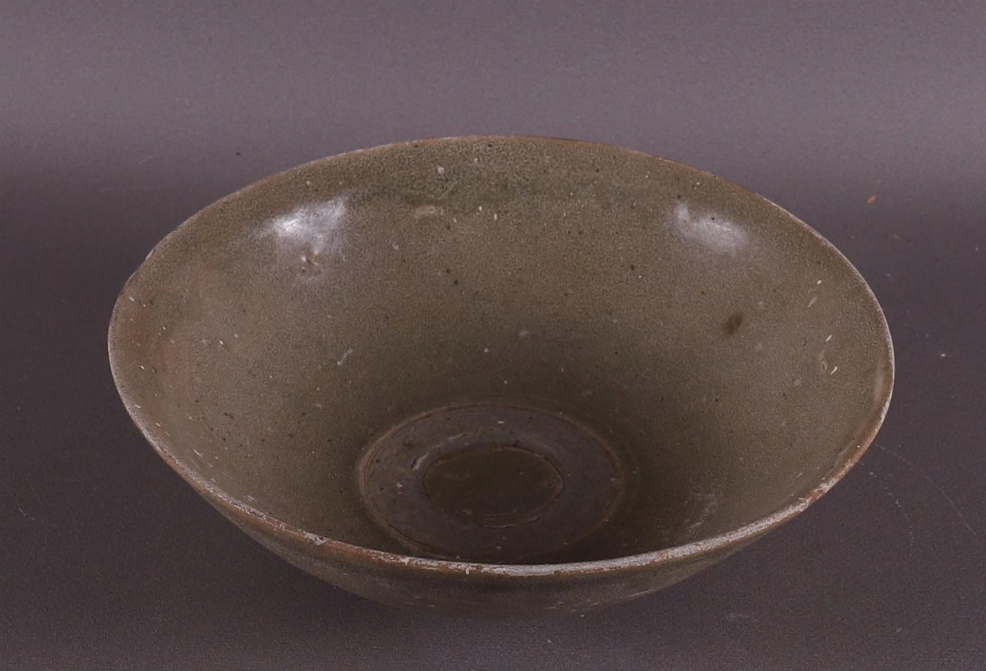 A green glazed stoneware bowl on stand ring, China, Song/Ming. - Image 2 of 8