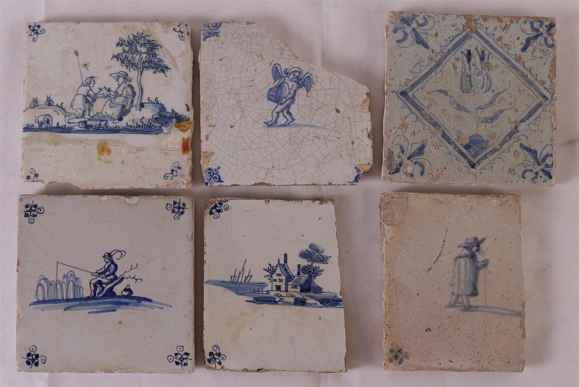 Twelve blue/white tiles with various scenes, 17th/18th century