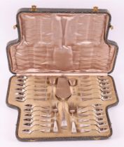 A 28-piece silver Art Nouveau hors d'oeuvre cutlery with hammered decor.