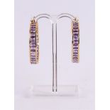 A pair of 14 kt 585/1000 yellow gold earrings, set with amethyst