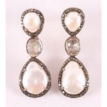 A pair of partly gold-plated silver earrings with 4 pearls, surrounded by diamon