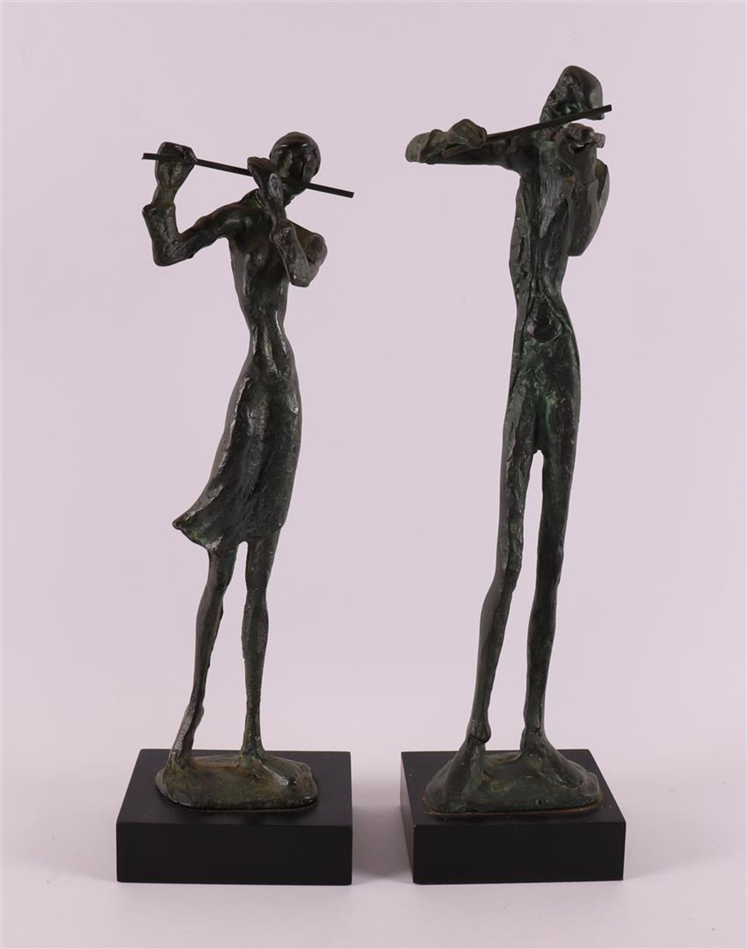 A set of green patinated bronze musicians in the manner of Ronald Tolman.