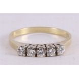 A 14 kt 585/1000 yellow gold row ring, set with five brilliant cut diamonds.