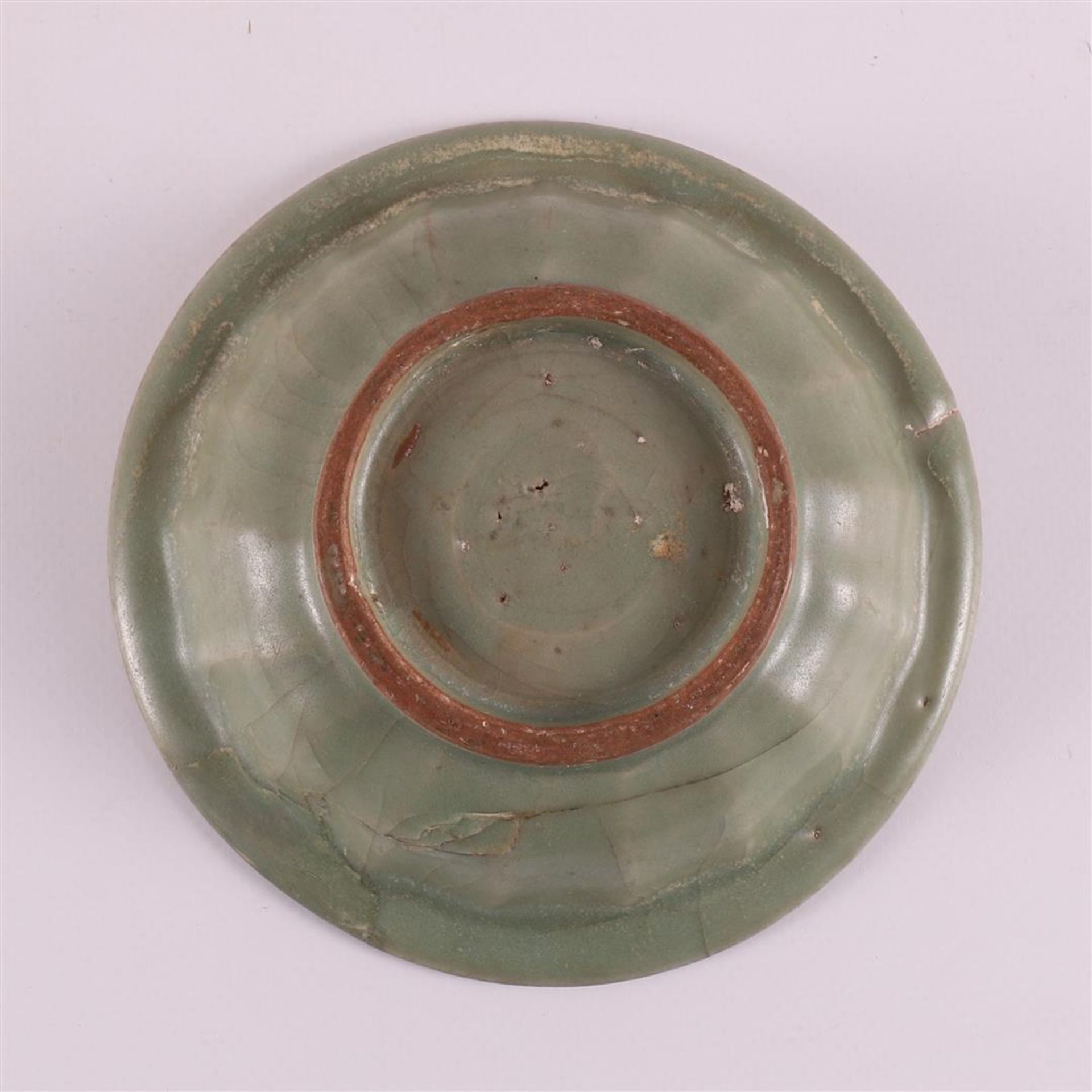 A green glazed celadon bowl with relief decoration of two fish, China, - Image 3 of 3