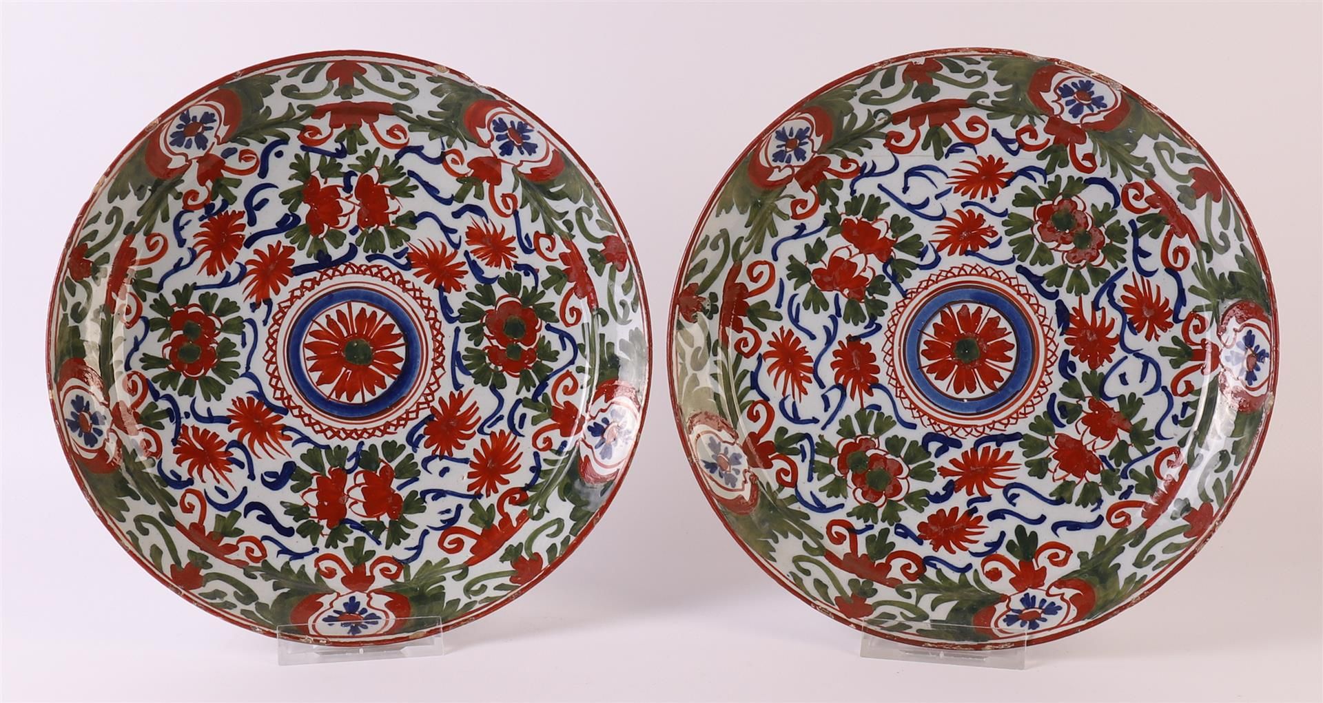 A set of polychrome Delft earthenware plates, so-called pancake, Holland