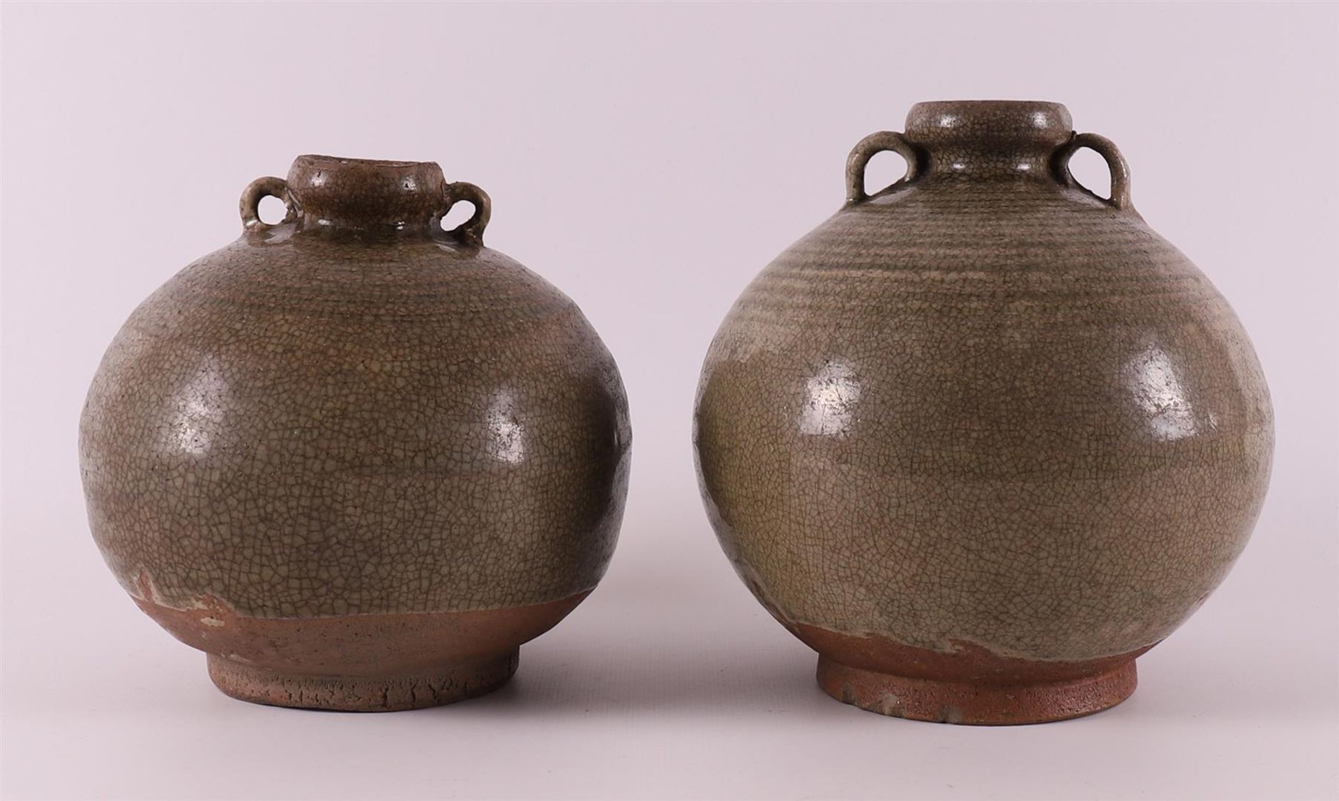 A pair of celadon glazed spherical vases with handles, China, Song Dynasty. - Image 2 of 4