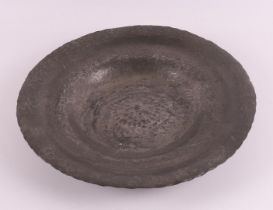 A white hammered pewter dish, signed: Methorst, ca. 1930