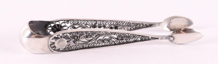 A second grade 835/1000 silver candy tongs with filigree work, ca 1900.