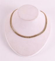 A 14 kt 585/1000 partly openwork gold choker.