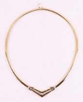 A 14 kt 585/1000 yellow gold choker, set with 9 diamonds.