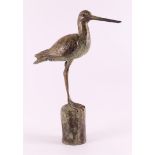 Jouta, Hans (Holwerd 9966). A brown patinated bronze godwit, 2018.