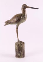 Jouta, Hans (Holwerd 9966). A brown patinated bronze godwit, 2018.