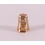 A 14 kt 585/1000 yellow gold thimble, around 1900