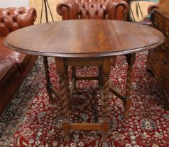 A gateleg table, England, early 20th century.