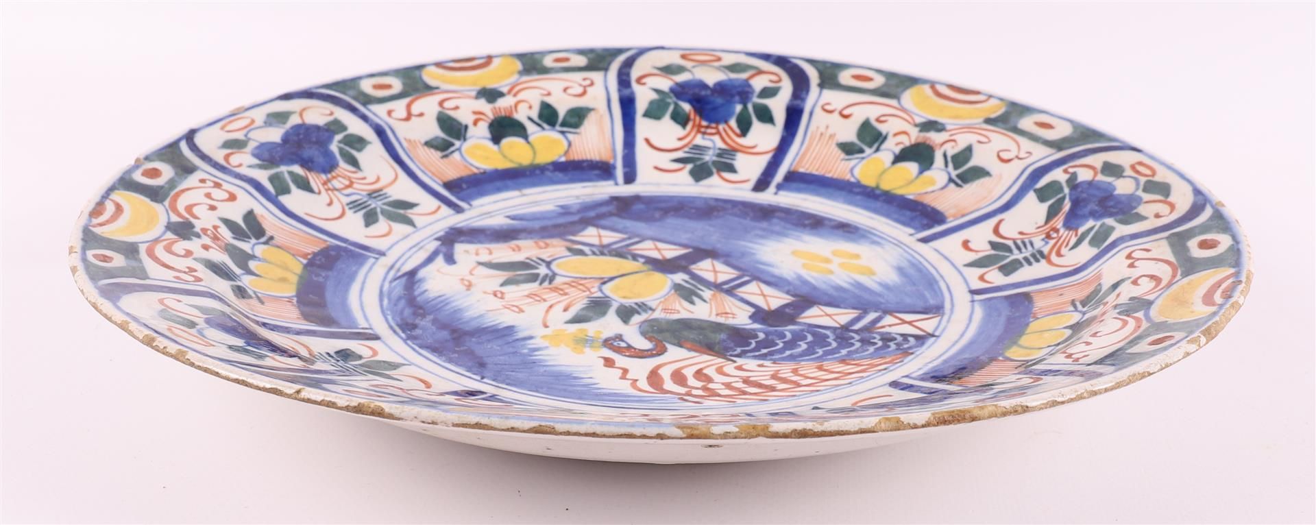 A polychrome Delft earthenware dish, 18th century. - Image 9 of 9