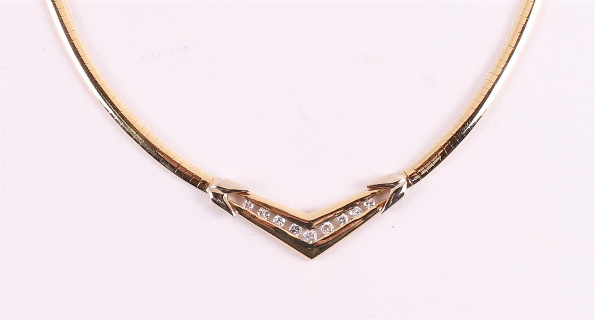 A 14 kt 585/1000 yellow gold choker, set with 9 diamonds. - Image 2 of 4